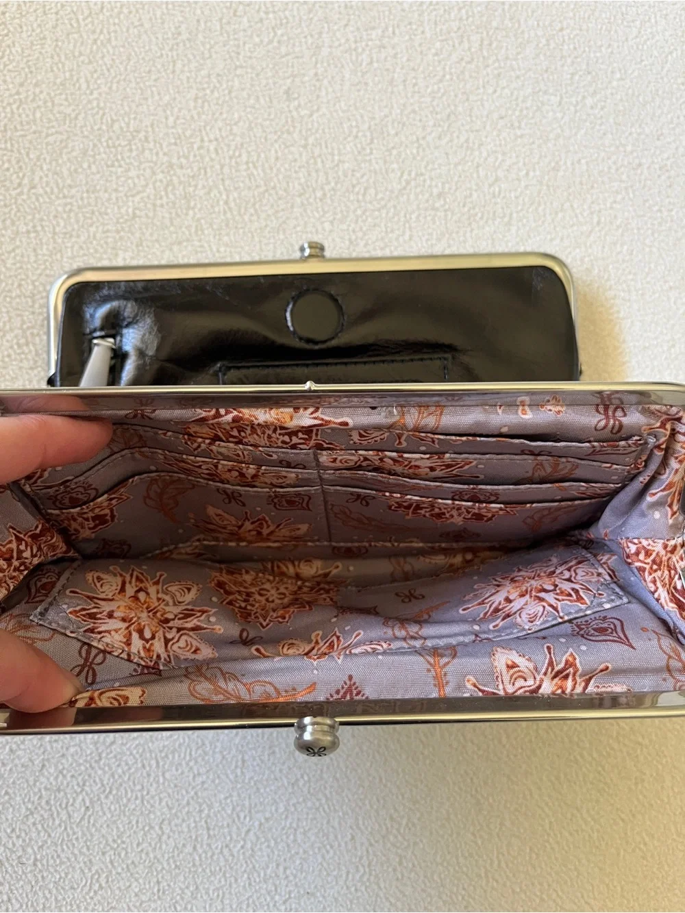HOBO Black Floral Flower Embossed Leather Wallet Clutch Paisley Lining Silver